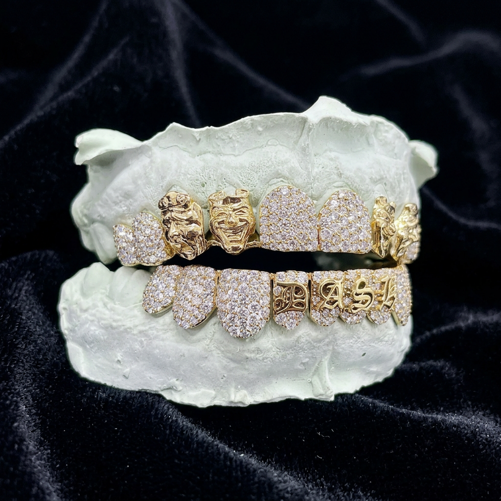 Custom gold and diamond grillz with mask details on black velvet